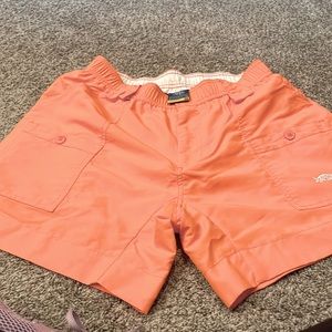 Worn once AFTCO mens shorts  size 34. Coral/ orange in color